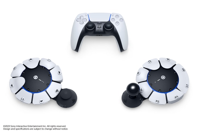 A futuristic looking hardware component with buttons and a stick.
